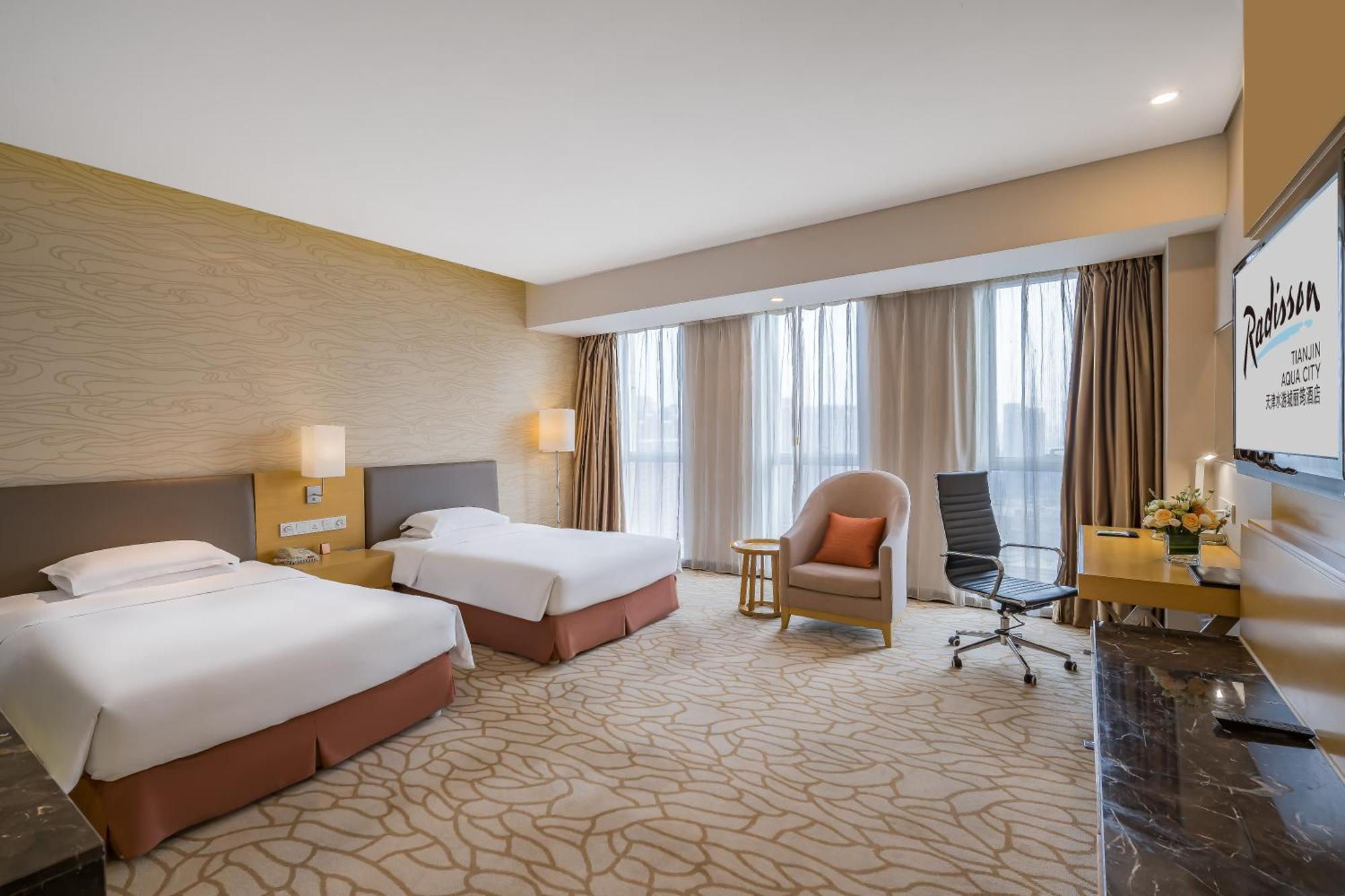 Radisson Hotel Tianjin Aqua City מראה חיצוני תמונה